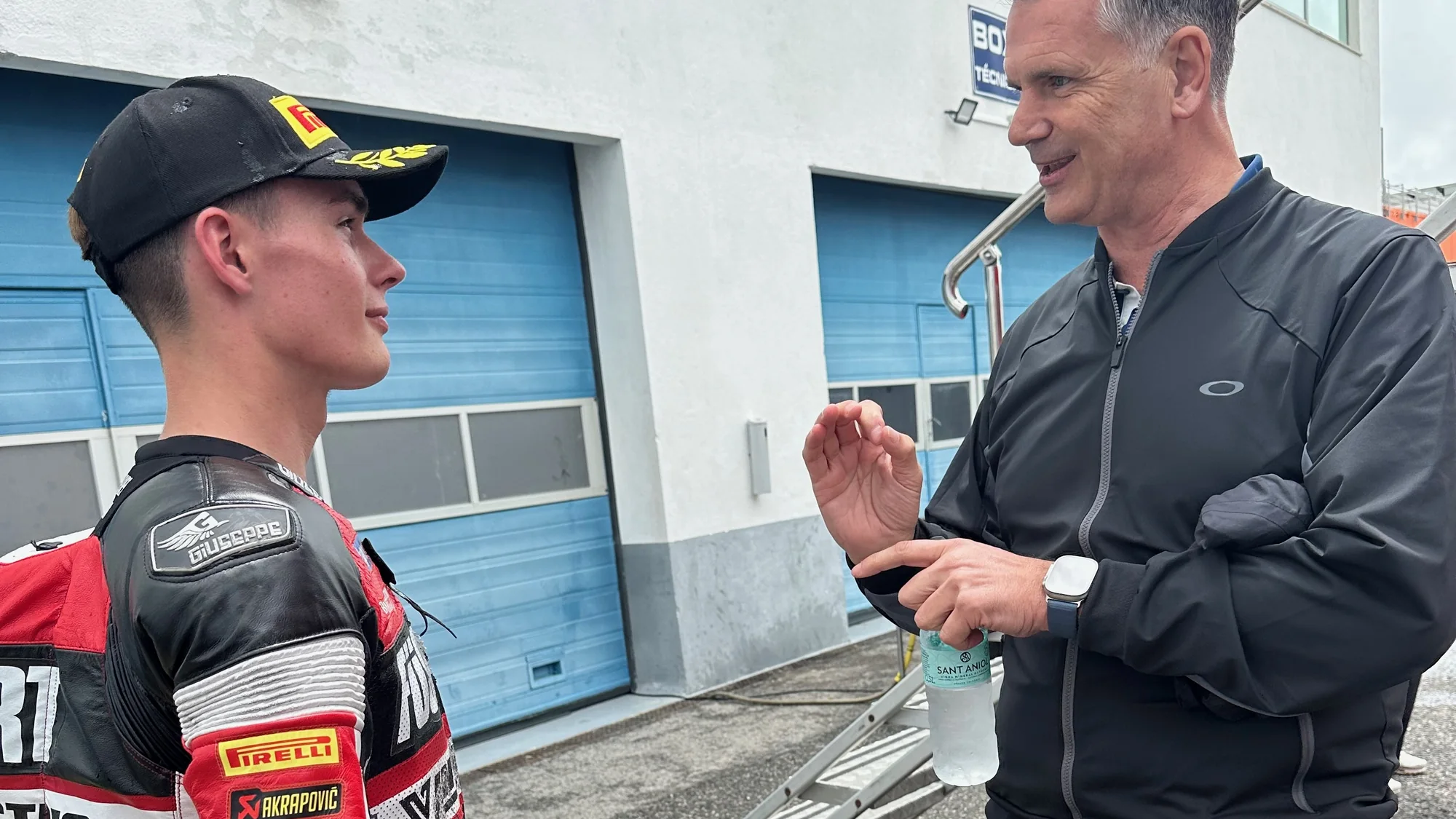 Craig Muirhead with Cormac Buchanan in the pit lane at Estoril, FIM JuniorGP