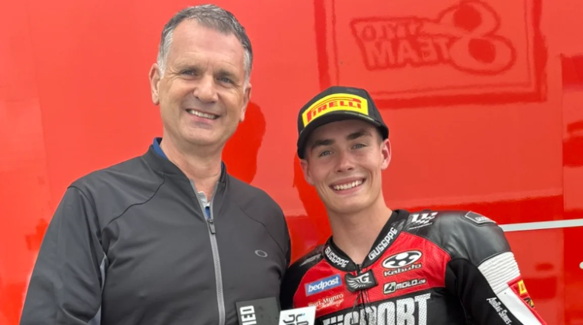 Craig Muirhead with a rider at the circuit